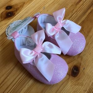 Sparkly Pink baby shoes with pink bows